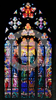 Stained-glass window in St Vit Cathedral, Prague photo