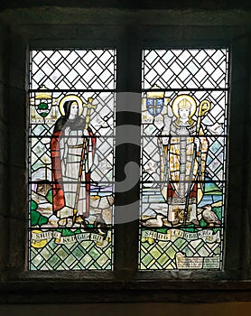 Stained glass windows at Caldbeck church in Cumbria