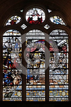 Stained glass windows in the church depicts The Parable of Those Invited to the Wedding Feast, Saint Etienne du Mont Church, Paris photo