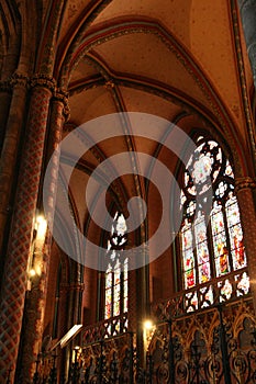 Stained-glass windows decorate one of the chapels of Saint-AndrÃ© cathedral in Bordeaux (France)