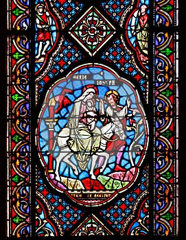 Stained glass windows depicting Mary, Jospeh and baby Jesus