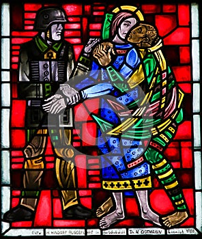 Stained Glass in Worms - Judas kissing Jesus photo