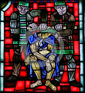 Stained Glass in Worms - Torture of Jesus on Good Friday photo