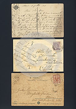 Stained old written postcards
