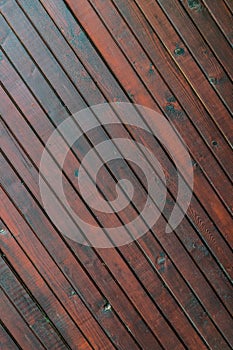 Stained wood planks fence background - diagonals lines
