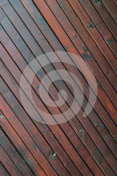 Stained wood planks fence background - diagonals lines photo