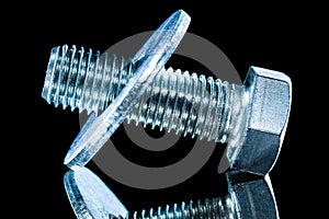 Stainless bolt washer screwbolt on black background