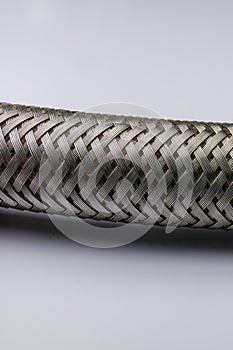 Stainless braided hose on white background
