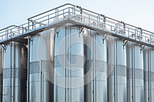 Stainless group vertical steel storage tanks for wine fermentation and maturation in modern winery factory production