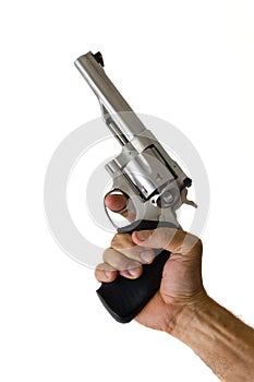 Stainless steel 44 Magnum handgun held in hand
