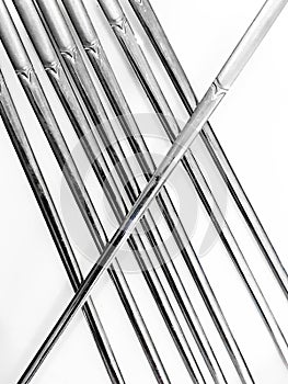 Stainless steel abstract background,isolated on white background, abstract lines background design from Stainless steel chopsticks