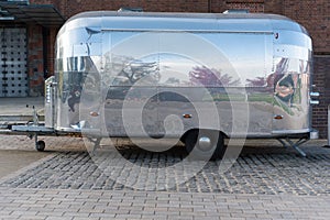 Stainless steel caravan with reflection