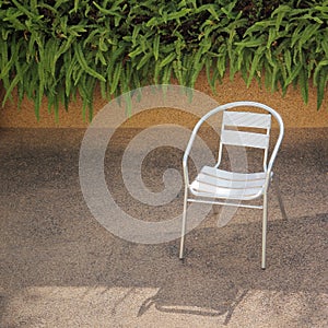Stainless steel chair in a garden