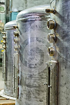 Stainless steel container with tap