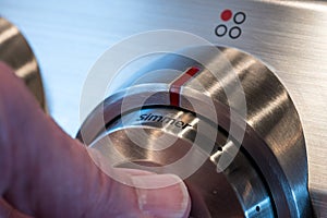 Stainless steel control knob on cooker