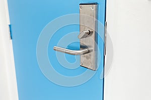 Stainless steel door handle in hotel