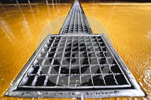 stainless steel floor drain at a modern beer factory