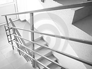 Stainless steel, glass and wood railing.Fall Protection. modern design of handrail and staircase