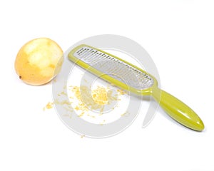 Stainless steel grate zester with lemon