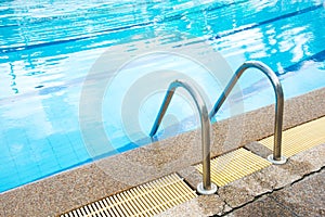 Stainless steel hand rail pool.