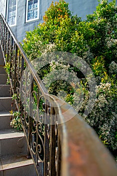 Stainless steel handrail on stairs in a housin