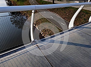 stainless steel mesh stretched on bridge railing.lower steel rope serves