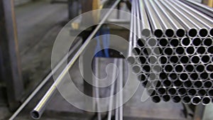 Stainless steel pipes are a finished product of metal rolling in factory.