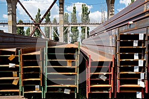 Stainless steel rails deposited in stacks photo