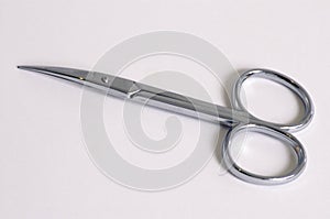 Stainless steel scissors on white background