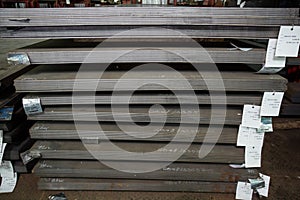 Stainless steel sheets deposited in stacks photo