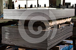 Stainless steel sheets deposited in stacks photo