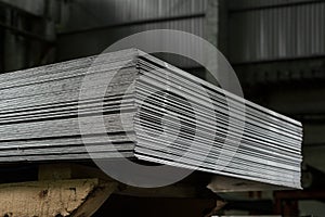 Stainless steel sheets deposited in stacks photo