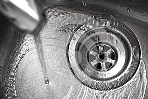 Stainless steel sink plug hole