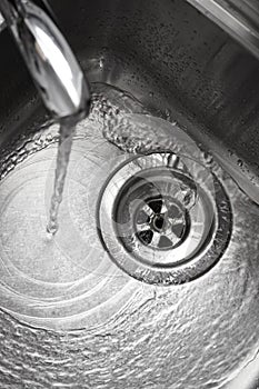 Stainless steel sink plug hole