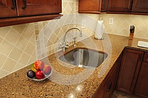 Stainless steel sink in a remodeled kitchen