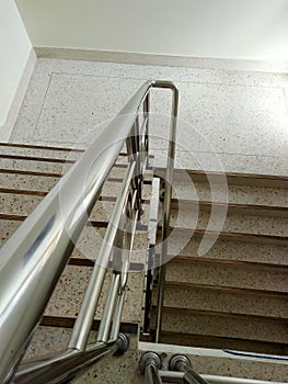 Stainless steel stairs in a 3-story building
