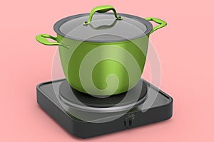 Stainless steel stewpot on portable camping electric stove on pink background