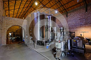 Stainless steel tanks for fermentation in modern Malbec wine factory, San Juan, Argentina, also seen in Mendoza