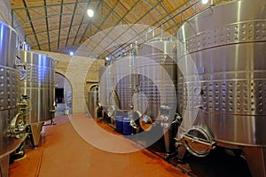 Stainless steel tanks for fermentation in modern Malbec wine factory, San Juan, Argentina, also seen in Mendoza
