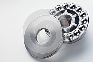Stainless steel thrust ball bearing. Set of thrust ball bearing and shiny silver ball bearing. Spare parts for roller machine in