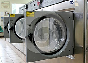 Stainless Steel Washing Machine Doors in Laundromat