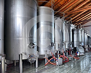 Stainless steel wine vats in a row