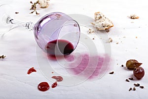 Stains on tablecloth of spilled wine glass and food