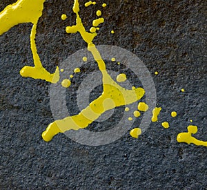 A stains of yellow paint and abstract image