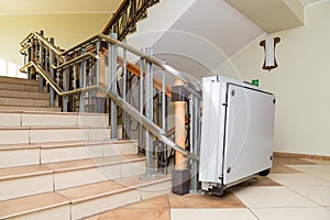 Stair lift for the disabled. Stairs of public building photo