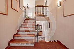 Stair sections of a detached house with old tiled steps