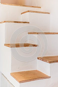 Stair steps leading up and down. Abstract stair inside the building. Stairway with unusual plan. Business concept