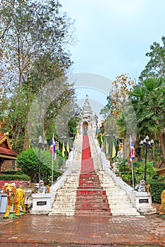 Stair to Golden pagoda for year of tiger at  Wat Prathat Cho Hae Temple, Phrae, Thailand