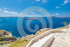 Staircase with blue sea bay view. Caldera and cliffs over volcano in Santorini Greece