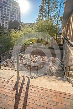 Staircase with bricks and floor mounted handrails at downtown Tucson, Arizona